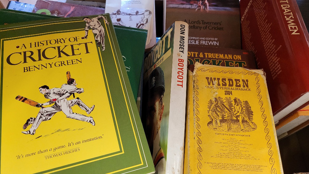 A quantity of cricket books, including a 1984 Wisden, Cardus on Cricket, various autobiographies