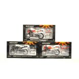 Three Minichamps 1:12 Valentino Rossi Collection Ducati corse motorcycle models, Desmosedici SP11
