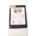 A Commemorative 2016 American Gold Eagle coin, 5 Dollar denomination contained in perspex casing