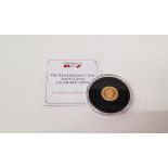 A commemorative Jubilee Mint Remembrance Day 9ct gold coin, in perspex case from Tristan da Cunha