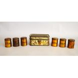 An Edwardian Lithographic Spice box, the hinged lid to reveal six cannisters titled Allspice,
