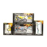 Two Minichamps Valentino Rossi Collection motorcycles with matching figurines, Yamaha YZR-M1 Camel
