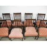 A set of eight Edwardian mahogany dining chairs, to include six side and two carvers, burr walnut
