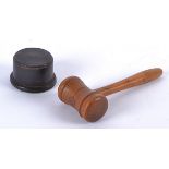 A walnut auctioneers gavel, length 18cm, together with a circular stand (2)