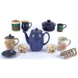 A selection of Denby ceramics, including a set of six mugs with floral decoration, a platter, mug,