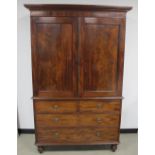 19th Century mahogany linen press, moulded cornice, double flame mahogany doors, two slides to the