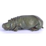 Rosalie Johnson (Contemporary British) green patinated cost cast bronze study of a sleeping hippo, a