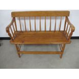 19th century pine and beech bench, spindle back, raised on round tapering supports, 97cm x 36cm x
