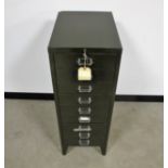 A vintage green metal filing cabinet, comprising of nine drawers, each measuring 9.5cm x 41cm x 8cm,