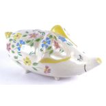 A large Bradwell Ware piggy bank designed by Arthur Wood in the form of a humorous pig, with pink,