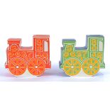 Two Carlton ware retro money banks in the form of locomotives, with psychedelic style designs, one