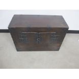 Continental stained pine cabinet , with two small doors to front, with metal fittings and banding,