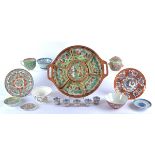 A selection of Asian ceramics, comprising bowls, plates, cups and saucers, covered pots, trays and