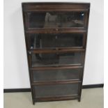 A Globe Wernicke style oak sectional bookcase, solid body, five stackable section with glazed up and
