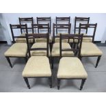 A set of ten late 19th Century mahogany dining chairs, by Jas. Schoolbread and Son, London, reeded