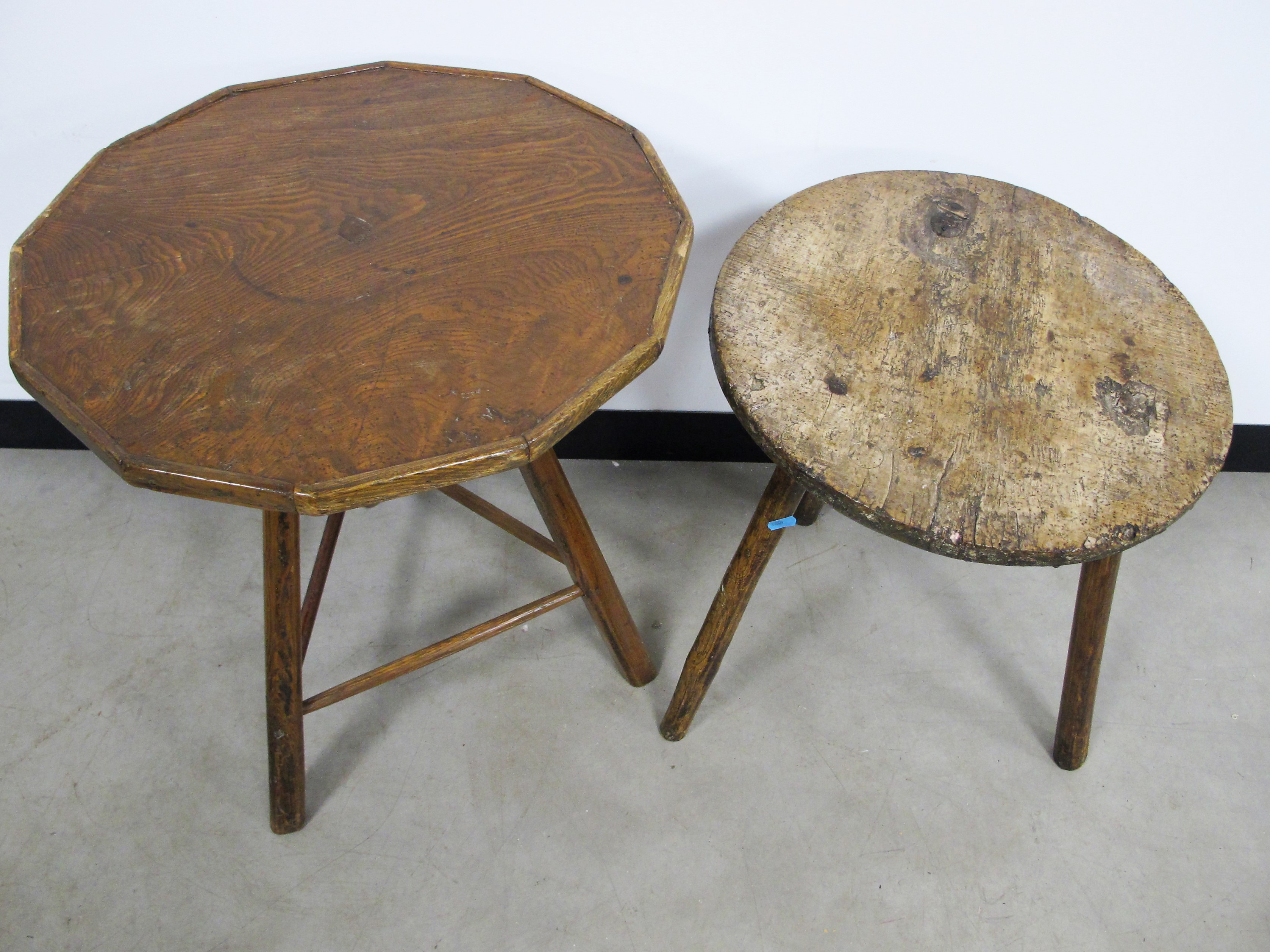 Two antique Cricket tables, one with a octagonal elm top the other from a fruitwood, 52cm x 66cm and