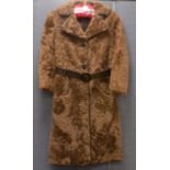 A ladies vintage sheepskin trench coat, with brown leather coat and satin lining, by Arthur Shaw,