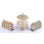 Two Carlton Ware pottery toast racks taking the form of figural playing cards, one clubs one spades,