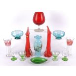 A quantity of contemporary glassware, including a pair of red vases, blue bowls, a set of seven