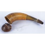 An antique style powder horn or flask, with etched decoration of Australian and African animals