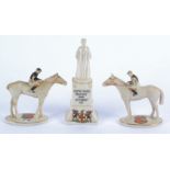 Two W.H. Goss 'Souvenir Racehorse' bearing the arms of Newmarket,  height 10cm, together with a