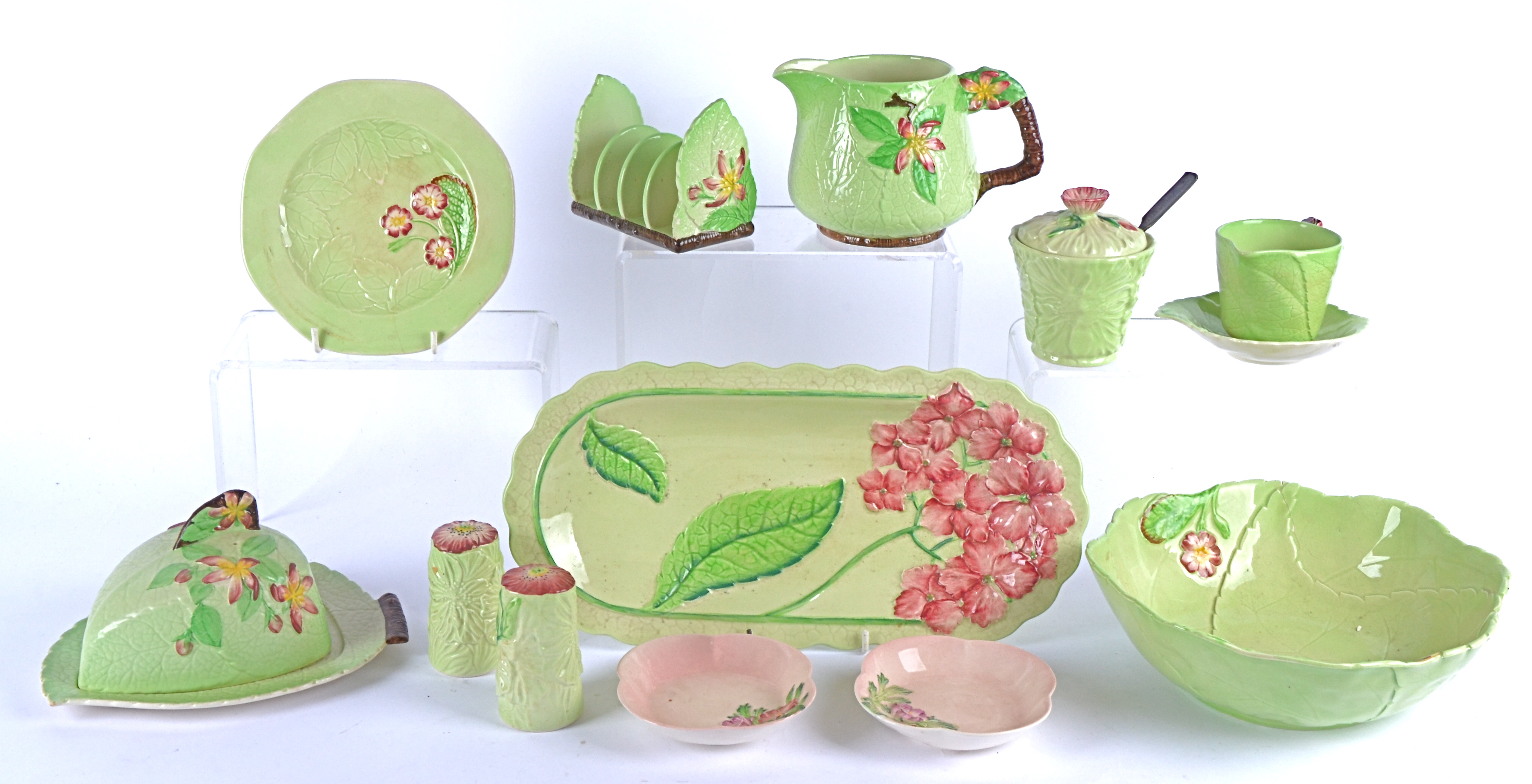 A large quantity of Carlton Ware pottery 'Salad Ware' moulded as leaves flowers and berries,