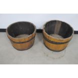 Two oak metal bound tubs / barrels, diameters 53cm and 49cm, height 36cm x 33cm metal rings loose