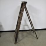 A vintage wooden pitch pine step ladder, six steps, labelled Drew Clarke and Co., Diamond Ladder,