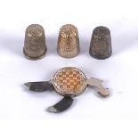 A vintage art deco manicure set in a disc, decorated with geometric patterns and motifs,