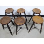 Six 19th Century stools, constructed from a combination of woods including beech and elm,