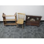 An early 20th Century three shelved oak wall rack with pierced decoration, 63cm x 60cm, together