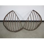 A pair of vintage cast iron hay racks, width 73cm, height 66cm