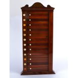 A mahogany billiards score board by Stevens & Sons London, with sliding doors containing mother of