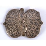 A Russian silver niello belt buckle, decorated with script and scrolls, with dagger fastener, 28g