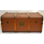 A 20th Century banded travel trunk, twin handles and metal lock and edgings, stamped 'C.C.C.' to