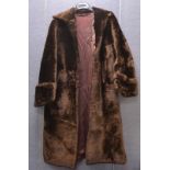 A 1950's Tescan beaver lamb fur coat, together with a brown fur stole from A.C. Edwards & Sons Ltd