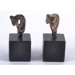 Two Eli Ilan (1928-1982) abstract silver sculptures, on black plinth bases, later recasting,