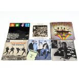 Beatles and Related EPs / 7" Singles, three EPs and approximately fifty 7" singles by The Beatles,