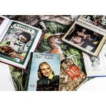 James Bond / Marilyn Monroe plus, an album containing coloured prints of celebrities including a