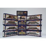 Bachmann OO Gauge Goods Wagons, a boxed group comprising Bolster Wagons 33-925 Gulf Red (2), 33-