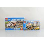 Two boxed Lego City models, High Speed Passenger Train 60051, unopened and Train Station 7937,