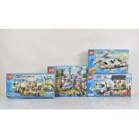 Four boxed Lego City models, including Police Boat 7899 unopened, Forest Police Station 4440