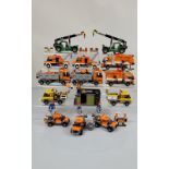 A collection of unboxed and unchecked Lego City, including 2 x Container Stacker 7992 with