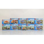 Eleven boxed Lego City models, including 4 x Tow Truck 60056 all opened with manuals and