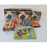 A collection of 1980s and later memory games, including a Bop it, Trivia timer, three Mini Wizard by