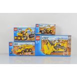 Four boxed Lego City models, Front End Loader 7630, Digger 7248, Dozer 7685 all opened with