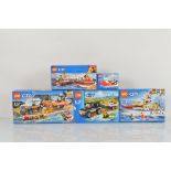 Five boxed Lego City models, including 4 x 4 Response Unit 60165 opened still in sealed polybags