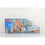 Three boxed Lego City models, including Hospital 7892 opened with manual, some sealed packets and