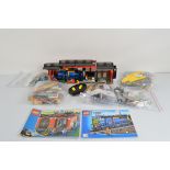 A collection of unboxed and unchecked Lego City, Cargo Train 60052 with manual and Train Engine Shed