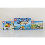Three boxed Lego City models, including Deep Sea Helicopter 60093 unopened, Ambulance Helicopter